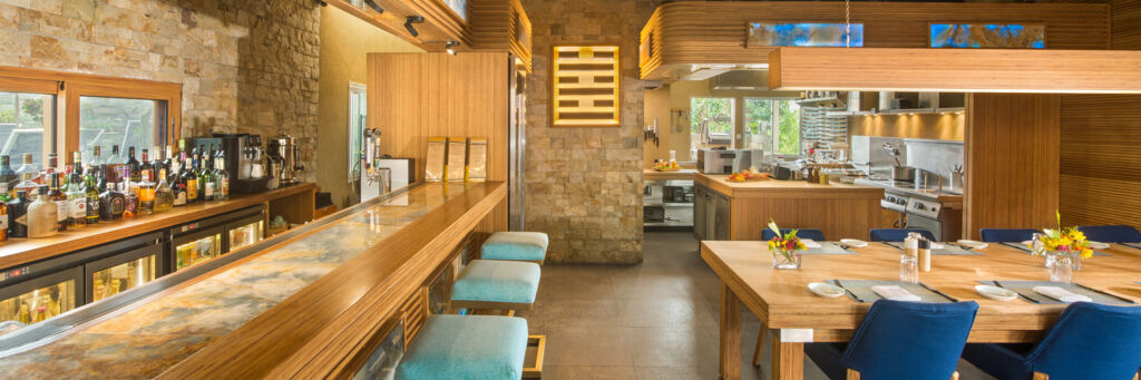 Bar, dining room, and kitchen at WE Kitchen in Turks and Caicos