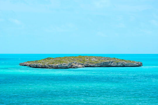 Small rocky island with beautiful turquoise water