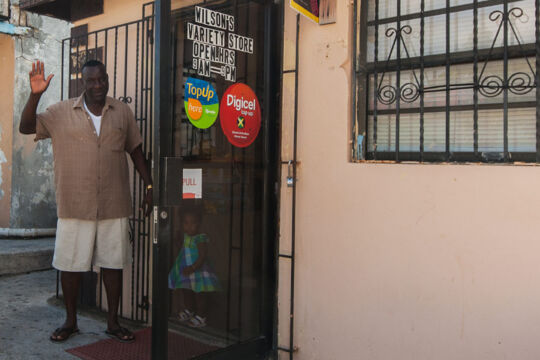 Shop owner outside a grocery store on South Caicos