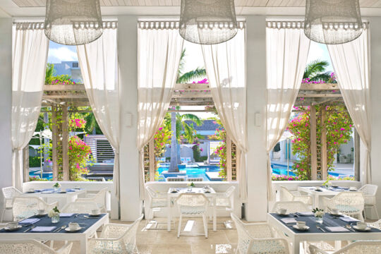 Open-air upscale restaurant at a resort. 
